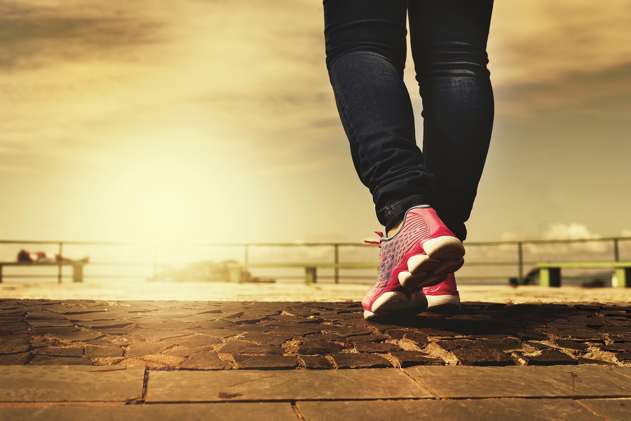 Legs, shoes, walking — "Catch College Football Games Online"