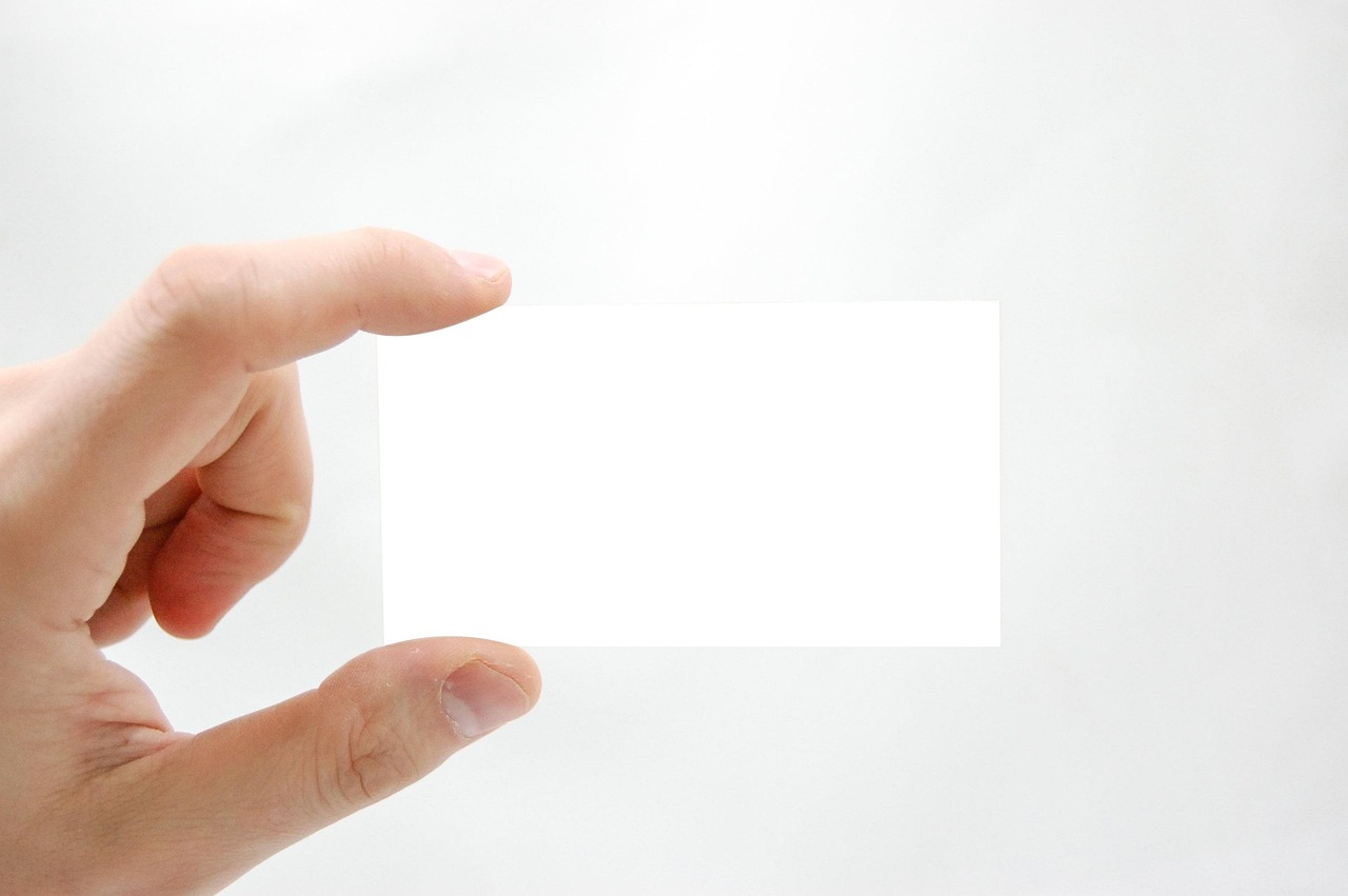Business card, business, hand — Max Herve George Builds Bridges Between Legacy and Modern Investment
