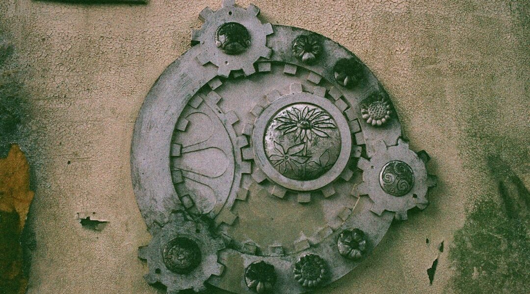 Decorative gear design on a textured wall